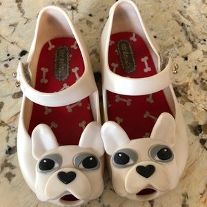 Size 7 white Mini Melissa’s dog sandals.